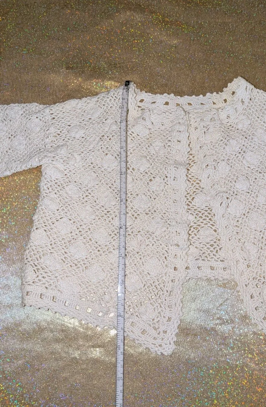 Crocheted Open-Front Baby Cardigan from Croatia
